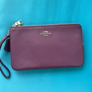 Coach purple wristlet.